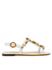Dolce&Gabbana Sandały CQ0601 AT848 Biały. Białe sandały damskie Dolce&Gabbana, bez wzorów, ze skóry, bez obcasa, na płaskiej podeszwie, bez zapięcia. Za 4,299.00 zł.