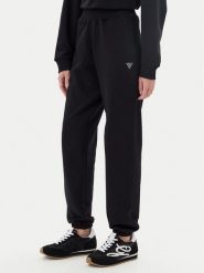 Guess Spodnie dresowe V5YB17 KCRP0 Czarny Regular Fit. Czarne spodnie dresowe damskie Guess, l, z aplikacjami, z bawełny. Za 229.99 zł.