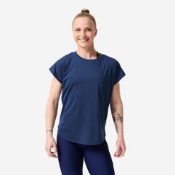 Koszulka fitness damska Domyos krótki rękaw. Niebieskie koszulki sportowe damskie DOMYOS, l, bez wzorów, z materiału, bez kołnierzyka, bez ramiączek, na fitness i siłownię. Za 49.99 zł.