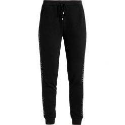 Liu Jo Jeans MILENA Spodnie treningowe black. Spodnie dresowe damskie marki Liu Jo Jeans. W wyprzedaży za 413.10 zł.