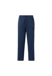 Spodnie męskie New Balance niebieski. Niebieskie spodnie sportowe męskie New Balance, l, bez wzorów, z materiału, trekkingowe. Za 477.85 zł.