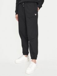 Guess Jeans Spodnie dresowe W4YB33 KC811 Czarny Regular Fit. Czarne spodnie dresowe damskie Guess Jeans, xl, z aplikacjami, z bawełny. Za 209.99 zł.