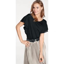 Koszulka w kolorze czarnym. T-shirty damskie marki Heine, z falbankami, z krótkim rękawem. W wyprzedaży za 86.95 zł.