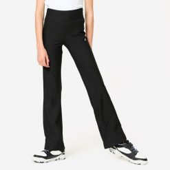 Legginsy fitness dziecięce Domyos rozkloszowane. Czarne legginsy dla dziewczynek Decathlon, bez wzorów, z materiału. Za 49.99 zł.