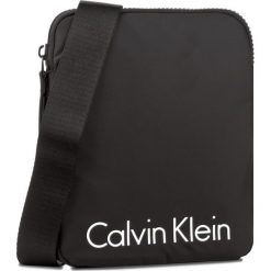 Saszetka CALVIN KLEIN - Blithe Flat Crossover K50K503447 001. Saszetki męskie marki Calvin Klein. W wyprzedaży za 239.00 zł.
