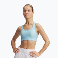 Biustonosz treningowy Under Armour Crossback Mid stream/white. Białe obuwie sportowe damskie Under Armour, bez wzorów, na fitness i siłownię. Za 99.99 zł.