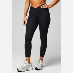 Legginsy 7/8 wysoki stan krzyżowane damskie Fabletics Oasis. Czarne legginsy damskie FABLETICS, xs, bez wzorów, z materiału. Za 361.35 zł.