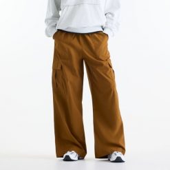 Spodnie damskie New Balance WP53504BFT – brązowe. Czarne spodnie sportowe damskie New Balance, m, bez wzorów, z materiału. Za 329.99 zł.