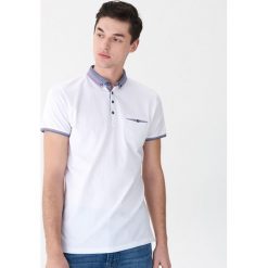 Koszulka polo z kontrastowymi wstawkami - Biały. Białe koszulki polo męskie House, l, bez wzorów, bez ramiączek. W wyprzedaży za 29.99 zł.
