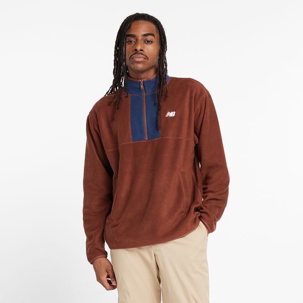 Bluza męska New Balance MT43518ROK – brązowa. Brązowe bluzy męskie New Balance, m, bez wzorów, z materiału, bez kaptura. Za 149.99 zł.