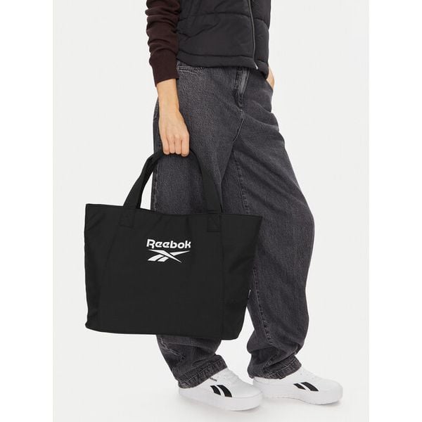 Torebka Reebok. Czarne torebki do ręki damskie Reebok, bez wzorów, bez dodatków. Za 99.99 zł.