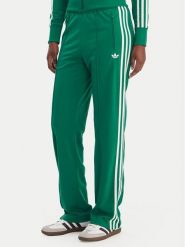 Adidas Spodnie dresowe Firebird Classic KD3649 Zielony Regular Fit. Zielone spodnie dresowe damskie Adidas, m, bez wzorów, z dresówki. Za 299.99 zł.