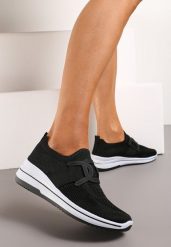 Czarne Wsuwane Buty Sportowe na Niewysokim Koturnie Wianara. Czarne obuwie sportowe damskie Renee, bez wzorów, z dresówki. Za 49.99 zł.