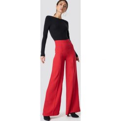 Trendyol Szerokie spodnie z wysoką talią - Red. Czerwone spodnie materiałowe damskie Trendyol, z poliesteru. Za 121.95 zł.