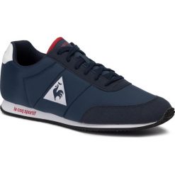 Sneakersy LE COQ SPORTIF - Racerone Nylon 1910787 Dress Blue/Pure Red. Niebieskie półbuty na co dzień męskie le coq sportif, z materiału, klasyczne, bez zapięcia. W wyprzedaży za 209.00 zł.