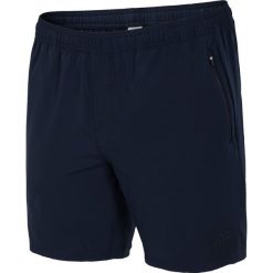 Spodenki treningowe męskie SKMT004 - granatowy ciemny. Niebieskie krótkie spodenki sportowe męskie 4f, z elastanu. W wyprzedaży za 99.99 zł.