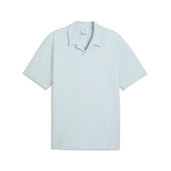 Męska koszulka polo Essentials Elevated PUMA. Niebieskie koszulki polo męskie Puma, m, bez wzorów, z bawełny, klasyczne, bez ramiączek. Za 169.00 zł.