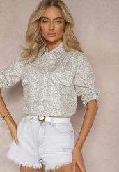 Jasnoniebieska Koszula z Bawełny o Luźnym Kroju w Drobne Kwiaty Findiana. Niebieskie bluzki damskie Renee, na lato, l, bez wzorów, z bawełny, eleganckie, bez kołnierzyka, bez ramiączek. Za 39.99 zł.