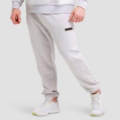 Spodnie męskie fitness regular szare Unity. Szare spodnie sportowe męskie GYMBEAM, l, bez wzorów, z bawełny, na fitness i siłownię. Za 118.90 zł.