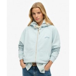 T-shirt raglan damski Superdry Essential Osz. Niebieskie koszulki sportowe damskie Superdry., bez wzorów, bez kołnierzyka, bez ramiączek. W wyprzedaży za 241.00 zł.