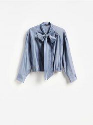 Bluzka z lyocellem - granatowy. Niebieskie bluzki damskie Reserved, l, bez wzorów, z lyocellu, bez kołnierzyka, bez ramiączek. Za 119.99 zł.