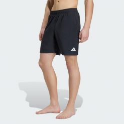 SZORTY DO PŁYWANIA Z NOGAWKAMI O DŁUGOŚCI 20,5 CM. Zielone krótkie spodenki sportowe męskie Adidas, l, bez wzorów, z materiału, do pływania. Za 119.00 zł.