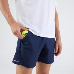 Spodenki do tenisa męskie Artengo Essential. Niebieskie buty sportowe męskie ARTENGO, m, bez wzorów, z materiału, tenisowe. Za 29.99 zł.