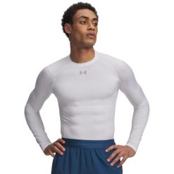 Under Armour Męska Koszulka HG Elite Comp LS 6015384. Białe koszulki sportowe męskie Under Armour, l, bez wzorów, z elastanu, bez kołnierzyka, bez ramiączek, na fitness i siłownię. Za 253.60 zł.