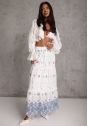 Biało-Niebieska Bawełniana Spódnica Casual w Stylu Boho Ozdobiona Wycięciami i Haftowanymi Wzorami Hermat. Niebieskie spódnice damskie Renee, l, z aplikacjami, z bawełny, boho, z podwyższonym stanem, maxi, dopasowane. Za 129.99 zł.