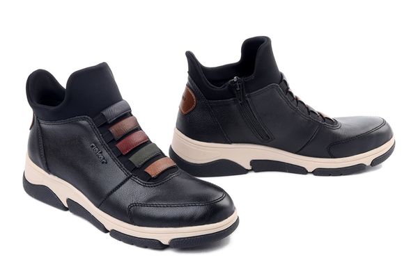 Rieker L5651-00 black, botki damskie. Czarne botki damskie Rieker, ze skóry, bez obcasa, bez zapięcia. Za 399.90 zł.