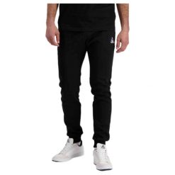 Wąskie spodnie do biegania Le Coq Sportif Pantalon de jogging ample Le Coq Sport. Czarne buty sportowe męskie le coq sportif, bez zapięcia, do biegania. Za 316.95 zł.