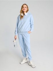 Bluza hoodie - błękitny. Niebieskie bluzy damskie Sinsay, l, bez wzorów, bez kaptura. W wyprzedaży za 19.99 zł.