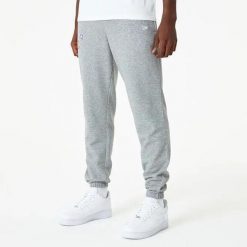 Spodnie dresowe Los Angeles Lakers Essentials. Szare spodnie sportowe męskie New Era, m, bez wzorów, z bawełny. Za 235.50 zł.