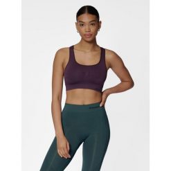 Bezszwowy biustonosz dla kobiet Hummel Shaping. Czerwone obuwie sportowe damskie Hummel, bez wzorów, na fitness i siłownię. Za 130.50 zł.