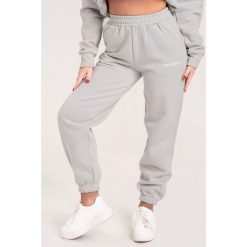 Spodnie fitness damskie Gym Glamour dresowe. Szare spodnie sportowe damskie GYM GLAMOUR, xs, bez wzorów, z dresówki, na fitness i siłownię. Za 189.99 zł.