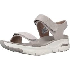 Sandały SKECHERS ARCH FIT TOURISTY Beżowy. Brązowe sandały damskie Skechers, bez wzorów, z tkaniny, bez obcasa, bez zapięcia. Za 284.99 zł.