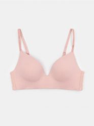 Bezfiszbiniowy biustonosz modelujący z formowanymi miseczkami - różowy. Czerwone biustonosze Sinsay, bez wzorów. Za 25.99 zł.