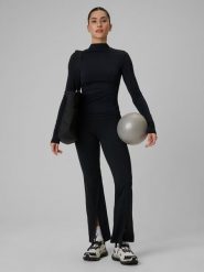 4F Spodnie treningowe z rozszerzanymi nogawkami damskie - czarne S. Czarne spodnie sportowe damskie 4f, s, bez wzorów, ze skóry, na fitness i siłownię. Za 169.99 zł.