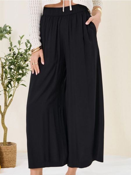 Wiskozowe spodnie culotte - czarny. Czarne spodnie materiałowe damskie Sinsay, l, bez wzorów, z wiskozy. Za 35.99 zł.