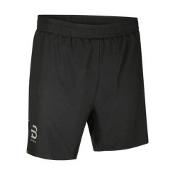 Szorty Daehlie Sportswear Run 365. Czarne krótkie spodenki sportowe męskie DAEHLIE, l, bez wzorów, z materiału, do biegania. Za 332.00 zł.