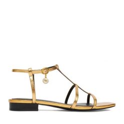 Sandały GINO ROSSI. Żółte sandały damskie Gino Rossi, bez wzorów, bez obcasa, na płaskiej podeszwie, bez zapięcia. Za 299.99 zł.