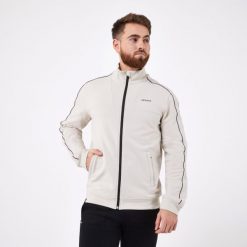 Bluza do tenisa męska Artengo Soft. Brązowe bluzy męskie ARTENGO, l, bez wzorów, z bawełny, bez kaptura, tenisowe. Za 129.99 zł.