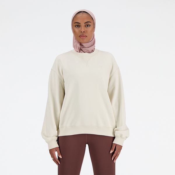 Bluza damska New Balance WT41500LIN – beżowa. Brązowe bluzy damskie New Balance, s, bez wzorów, z bawełny, bez kaptura. Za 359.99 zł.