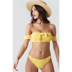 Camille Botten x NA-KD Smocked Bikini Bottom - Yellow. Bikini damskie marki Camille Botten x NA-KD. Za 100.95 zł.