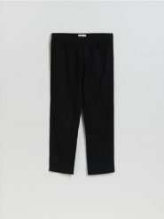 Bawełniane spodnie jogger - czarny. Czarne spodnie materiałowe męskie Reserved, l, bez wzorów, z bawełny. Za 119.99 zł.