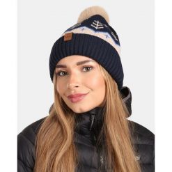 Damska czapka zimowa Kilpi CARMEN-W. Niebieskie czapki i kapelusze damskie Kilpi, na zimę, bez wzorów, z wełny, sportowe. Za 60.57 zł.