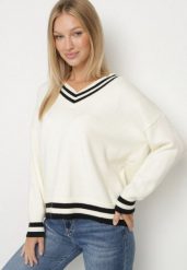 Jasnobeżowy Sweter z Domieszką Kaszmiru w Stylu Preppy Liendria. Brązowe swetry damskie Born2be, z aplikacjami, z dzianiny, biznesowe, bez kołnierzyka, bez ramiączek, bez kaptura. Za 119.99 zł.