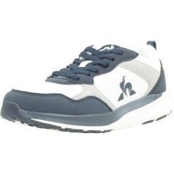 Kapcie LE COQ SPORTIF 2422716L Niebieski. Niebieskie kapcie damskie le coq sportif, bez wzorów, z tkaniny. W wyprzedaży za 185.70 zł.
