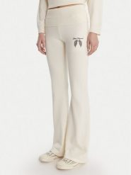 Guess Spodnie dzianinowe W6RB63 Z2V62 Écru Relaxed Fit. Spodnie materiałowe damskie Guess, xs, z aplikacjami, z dzianiny. Za 389.99 zł.