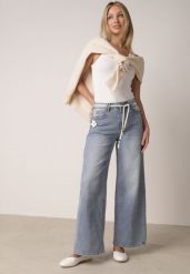 Niebieskie Jeansy z Bawełną o Szerokim Kroju z Wysokim Stanem i Sznurkowym Paskiem Ianaia. Niebieskie jeansy damskie Born2be, z podwyższonym stanem. Za 119.99 zł.